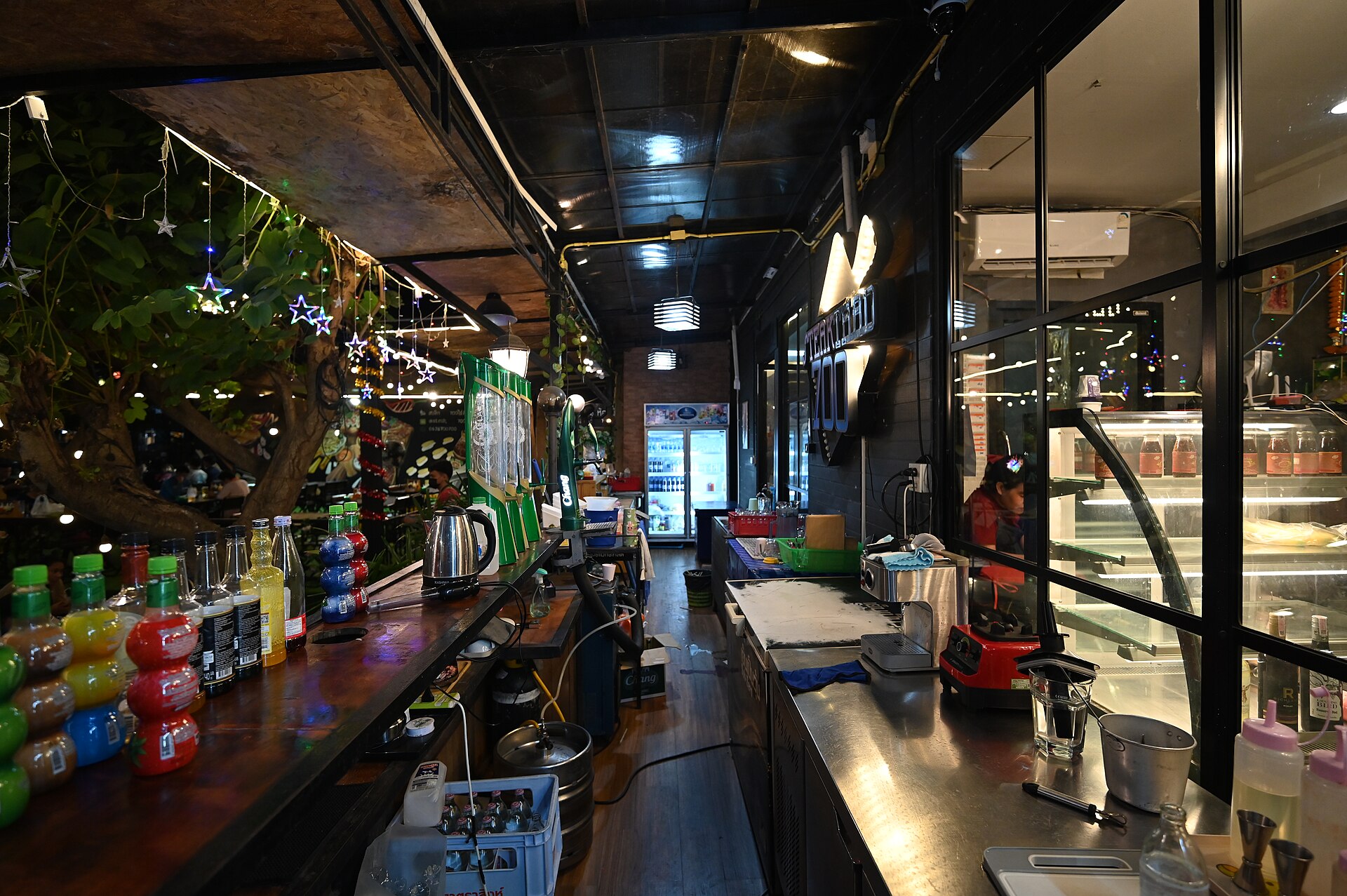 Bottles lined up on a bar counter